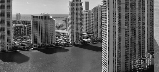 Downtown Miami aerial view, Florida from drone viewpoint. City skyline on a wonderful sunny day, slow motion.