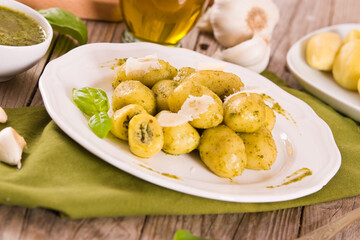 Potato gnocchi stuffed with pesto sauce.
