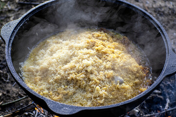 hot pilaf in a cauldron