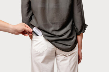 Bank fraud. Financial crime. Personal data security. Electronic transaction risk. Male thief hand...
