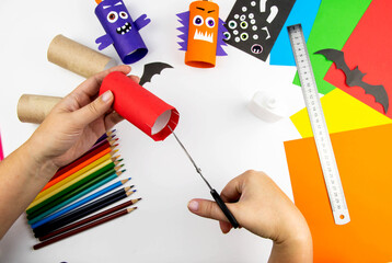 Halloween decoration. DIY and kids creativity concept. Step by step instructions: make a monster...