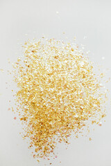 Beautiful festive white background with golden confetti.