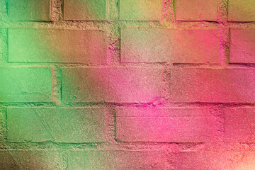 Beautiful bright colorful street art graffiti background. Abstract creative spray drawing fashion colors on the brick walls of the city. Urban Culture gradient texture, copyspace backdrop