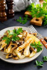 Potato fried with champignon mushrooms