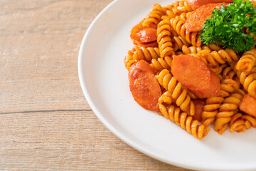 spirali or spiral pasta with tomato sauce
