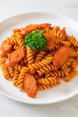 spirali or spiral pasta with tomato sauce
