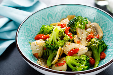 Chicken stir fry with vegetables and mushrooms