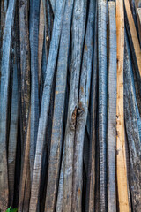 Fototapeta premium Wooden sticks for fence construction