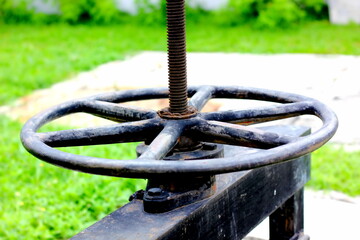 close up wheel cogs of floodgate for controlling water