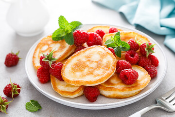 Breakfast pancakes with fresh raspberry