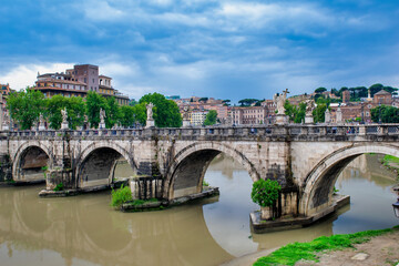 Fototapeta na wymiar Bridge over the Tiber river in Rome, Italy