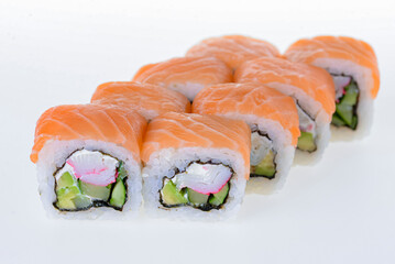 Eight sushi fresh maki rolls, isolated on white. Set of maki rolls with philadelphia cheese. Japanese cuisine.