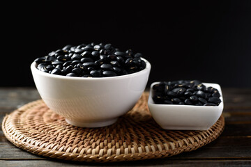 Close up of organic black beans in healthy food concept