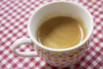 creamy coffee in a cup