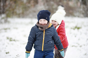 Children in winter park play