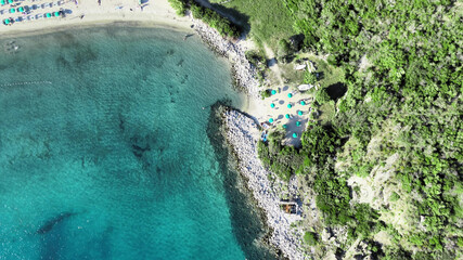 Aerial view of Elba Island. Cavoli Beach and Southern Coastline in summer season. Drone viewpoint. Slow motion.