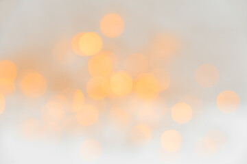 Christmas Lights Background. Copy Space. Christmas abstract background. Yellow bokeh on the white...