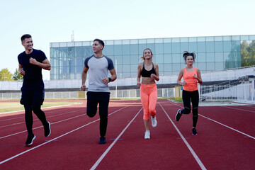 Group  running on an athletic track