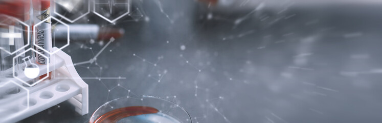 Background tubes with tests for coronavirus. Laboratory studies of viral diseases. Blood sample for testing the dangerous virus coronavirus in the body.