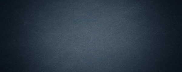 Texture of old navy blue paper closeup
