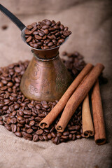 Coffee beans and cinnamon sticks