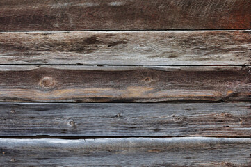 Obraz premium Old wooden boards. Brown wall made of wooden planks