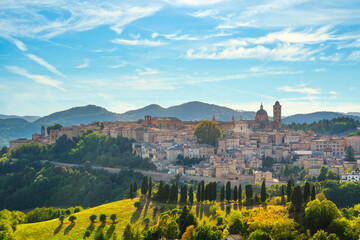 Urbino city skyline and countryside landscape. Marche region, Italy. - 384713087