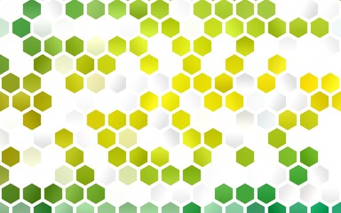 Light Green, Yellow vector background with hexagons.