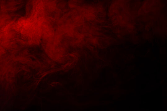 Abstract background - Red smoke on a black background