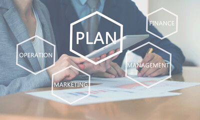 Successful young consultants working in an office, business plan