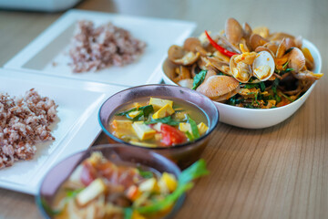 stir fried spicy clams shell with basil leaves