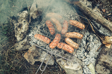 delicious sausages on the fire