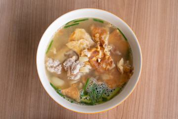 Omelet fried egg minced pork soup