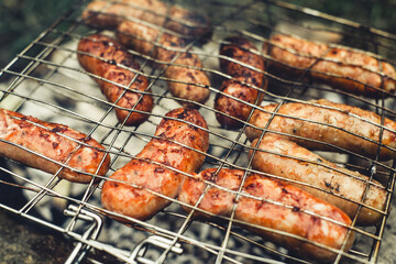 delicious sausages on the fire