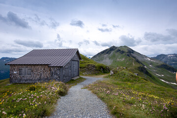 mountain hut in the mountains, landscape in the austrian mountains, swiss alpine village, alpine hut in the mountains, house in the mountains