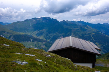 Fototapeta na wymiar alpine hut in the mountains