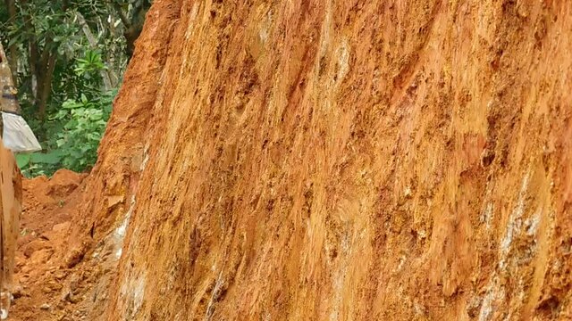 Closeup of a JCB vehicle working on the earth surface