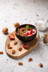 Granola yogurt with strawberries and chia seeds