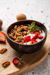 Granola yogurt with strawberries and chia seeds