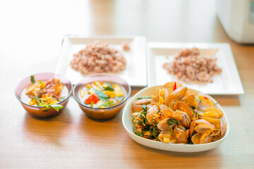 stir fried spicy clams shell with basil leaves