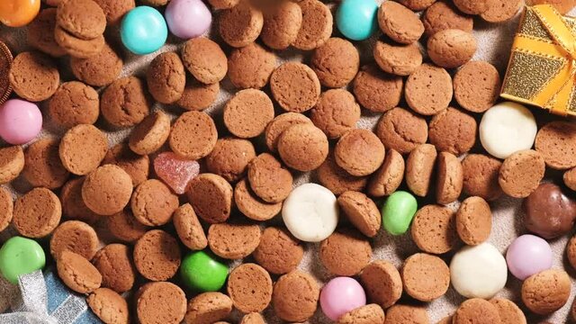 Falling down traditional dutch cookies kruidnoten gingersnap. St Nicholas day Sinterklaas in December, children holiday in Netherlands and Belgium. Full HD video, 100 fps slow motion