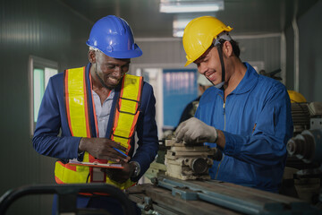 metal work factory technician inspector and worker in lathe workshop