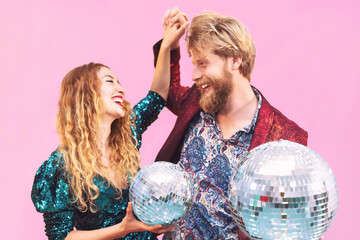 Happy couple celebrating valentines anniversary in disco club - Young trendy people having fun...
