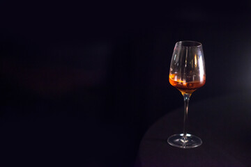 wine glass on dark background