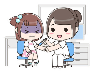 女性医師と予防注射を受ける女の子