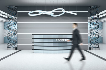 Businessman walking in futuristic hotel reception table