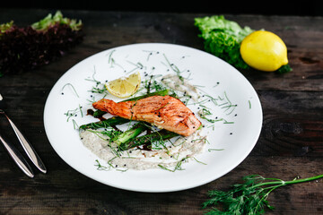 Baked salmon with asparagus and sauce