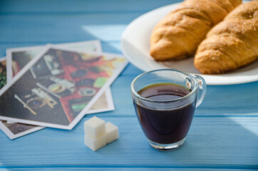 still life of cake with cup of coffee highlighted by sunlight