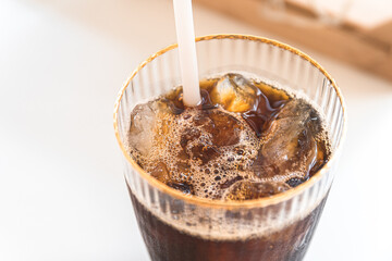 iced americano and ice cube in a Cup
