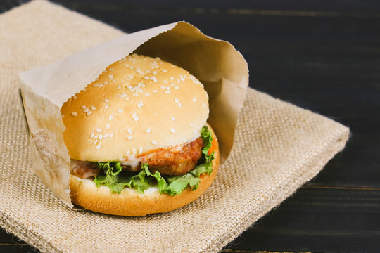 burger on wooden table